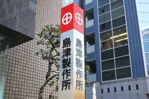 島津製作所子会社「タイマー」仕掛けて故障装い約228万円の部品交換に「都…