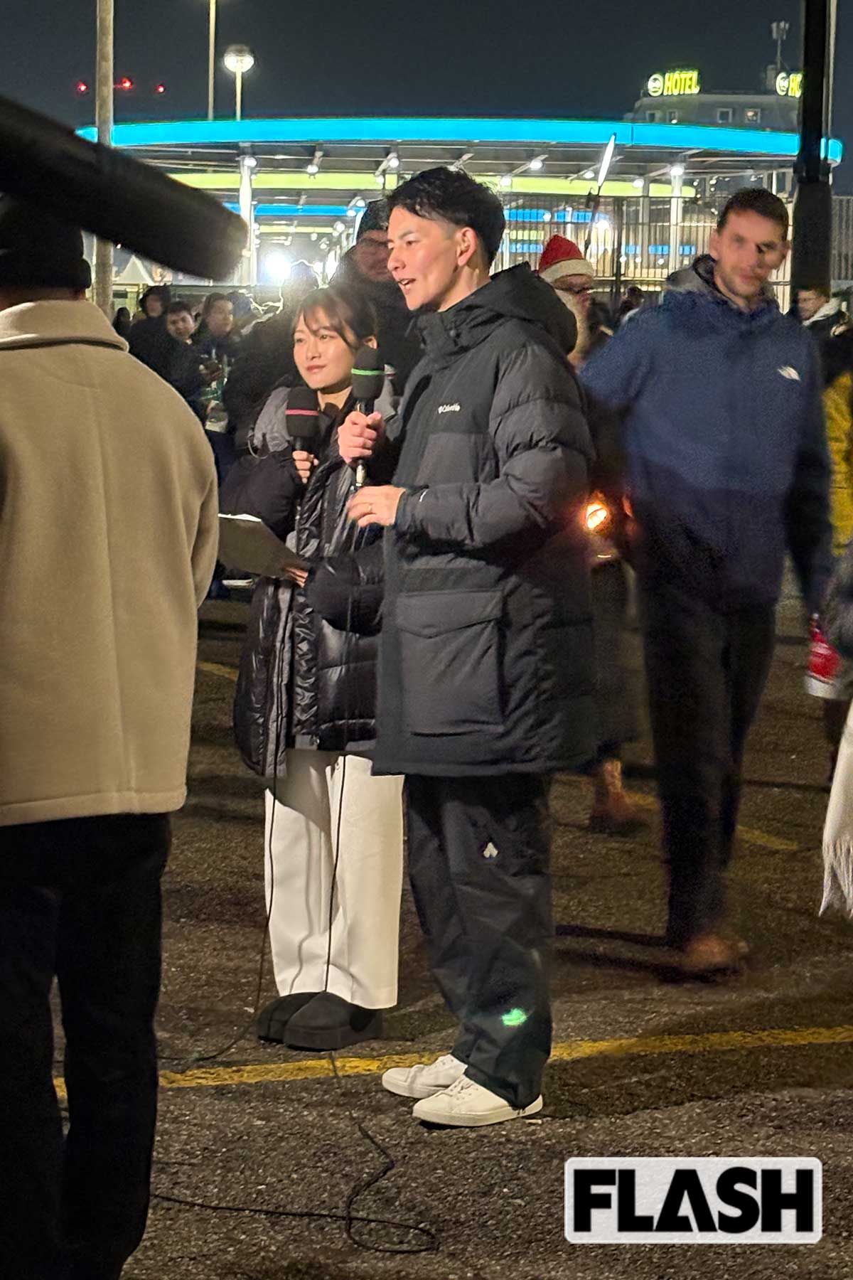 2026年2月7日（イタリア時間）、ミラノ・コルティナ冬季オリンピックの開会式直後に取材をおこなうフジテレビの原田葵アナウンサー（左）と大川立樹アナウンサー