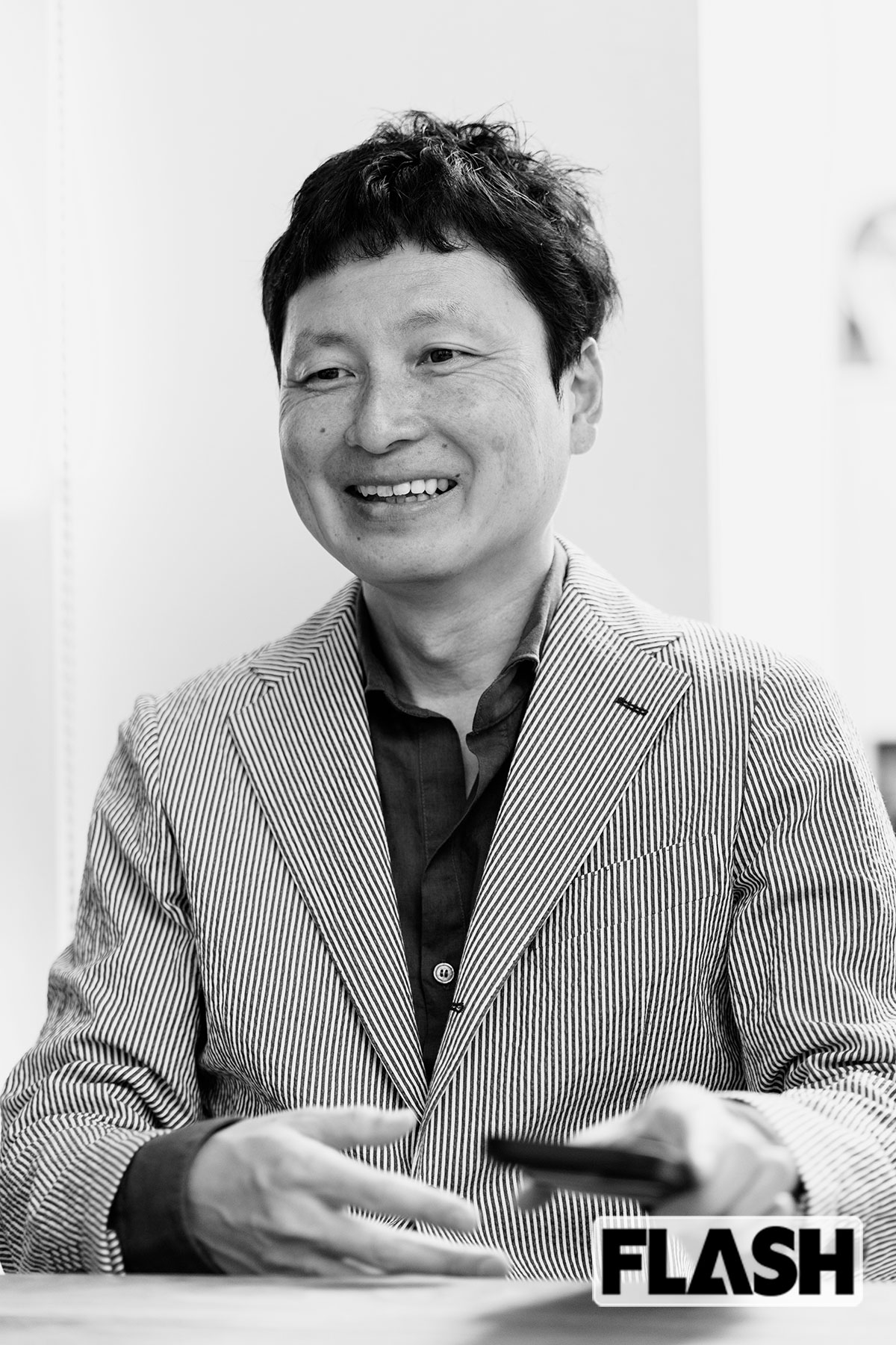 菊地崇仁さん／ポイント交換案内サービス「ポイ探」を運営。ポイント、マイル、クレジットカードの活用法を発信する（写真・福田ヨシツグ）