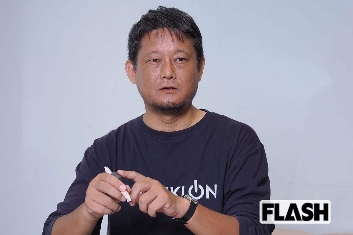 「やる気ペン」開発者の中井信彦さん。「開発に必要なのは “共感” 」だという（写真・梅基展央）