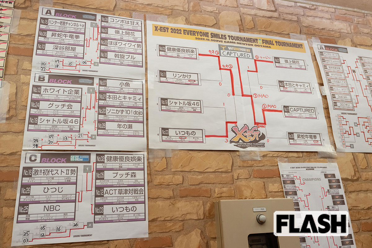 「ゲームニュートン大山店」店内の壁には過去に主催された大会の結果表がびっしりと並ぶ