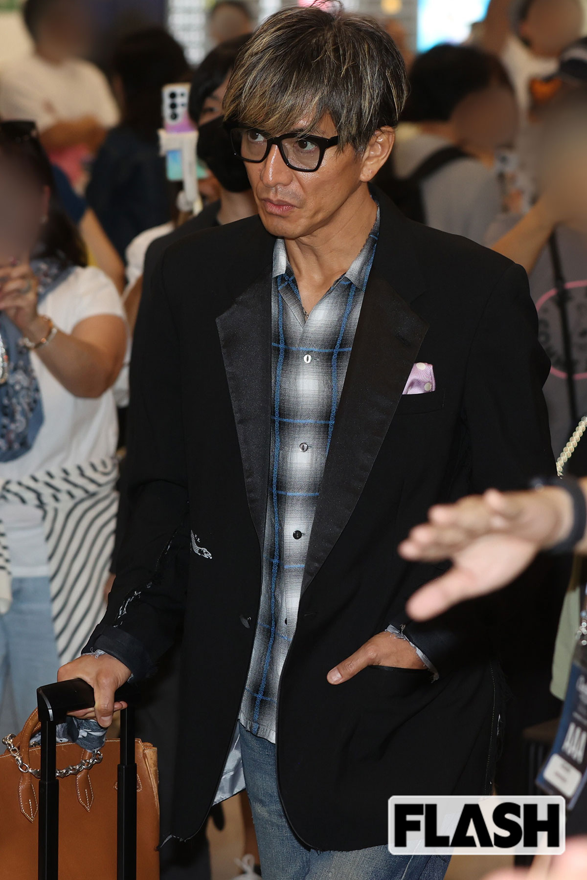 ラフなアメカジながら、さすがのスタイルを披露した木村拓哉